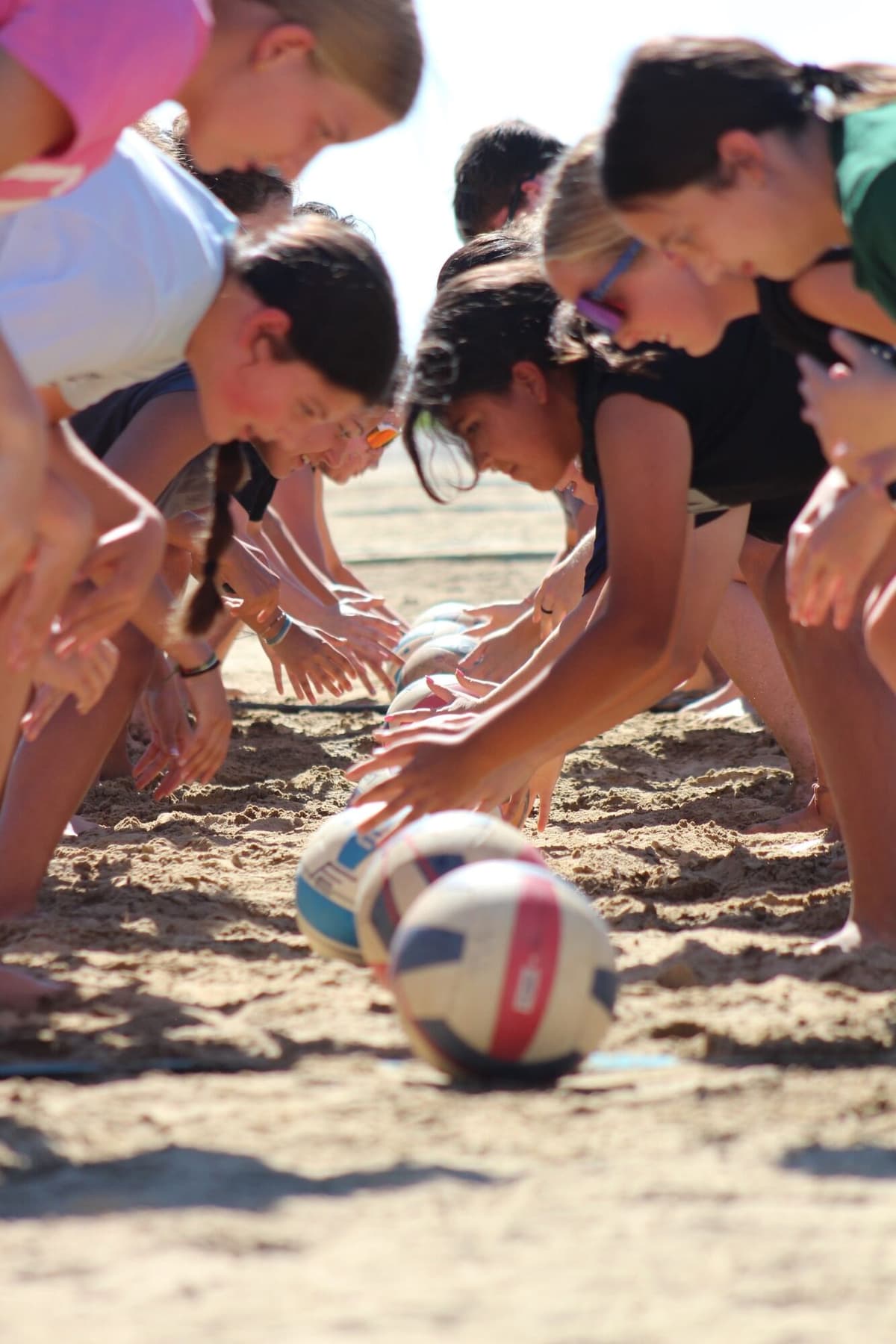 TVA athletes competing on the sand court