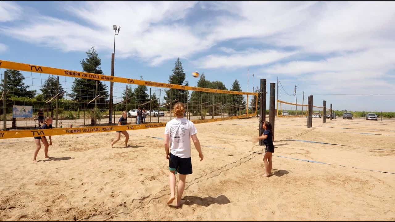 TVA athletes playing at the sand courts