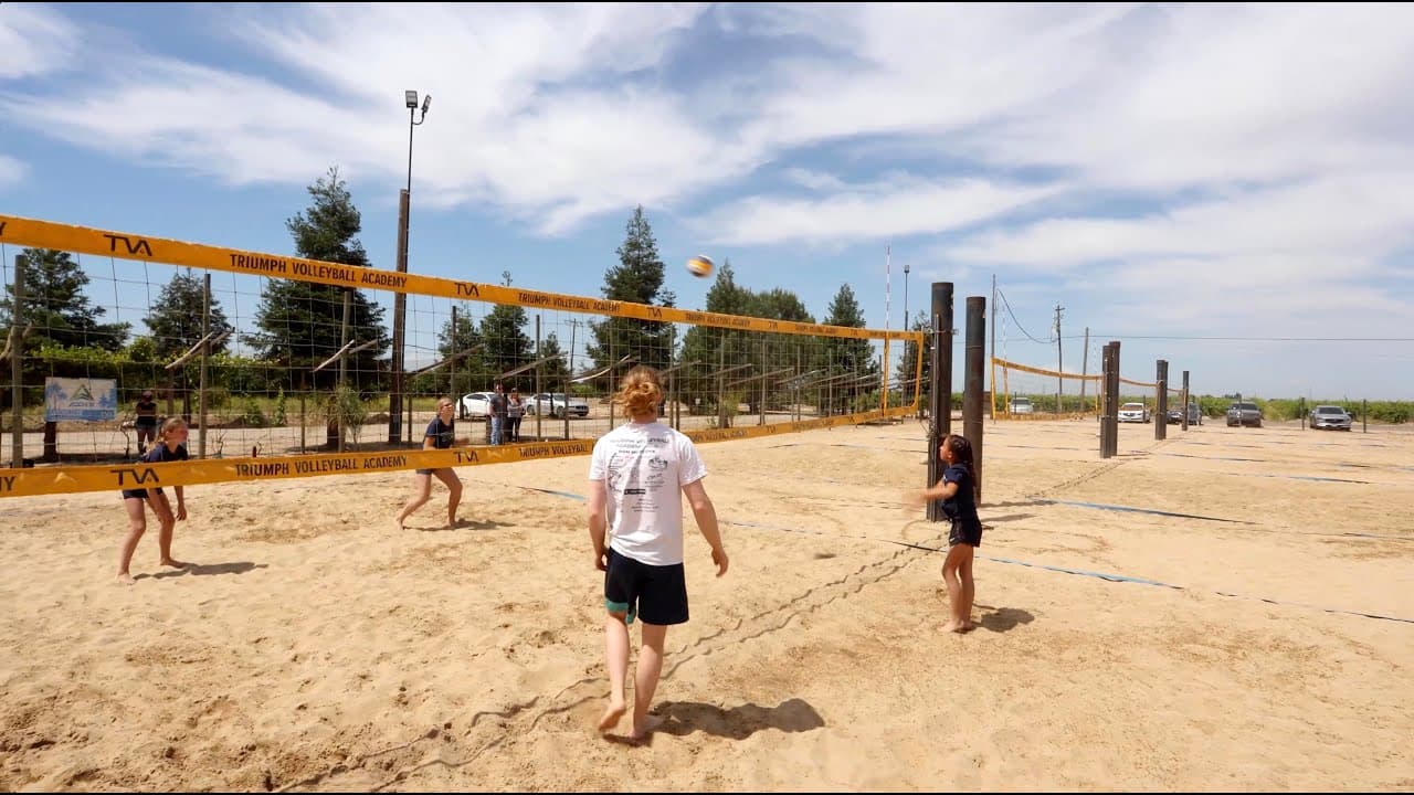 TVA athletes competing on the sand court